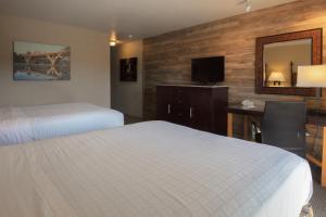 Letto o letti in una camera di Riverside Inn