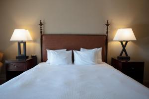 Letto o letti in una camera di Riverside Inn