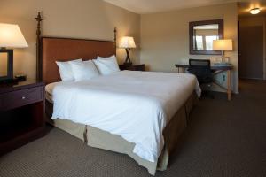 Letto o letti in una camera di Riverside Inn