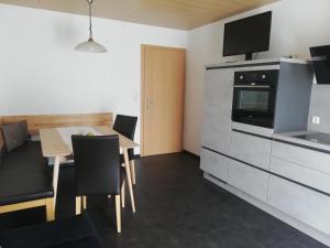 Kuchyň nebo kuchyňský kout v ubytování Haus Matt