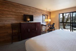 Letto o letti in una camera di Riverside Inn