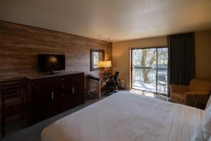 Letto o letti in una camera di Riverside Inn