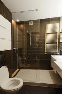 Kúpeľňa v ubytovaní LupoApartments Marea Dostęp na Kod