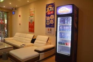 a room with a soda vending machine in a store at 7Days Inn Emeishan Center in Leshan