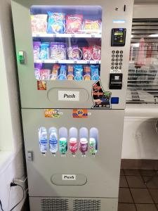 a vending machine with food and drinks in it at Motel 6-Canon City, CO 719-458-1216 in Canon City