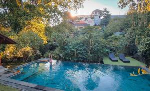 Bazén v ubytování Yuliati House Ubud nebo v jeho okolí