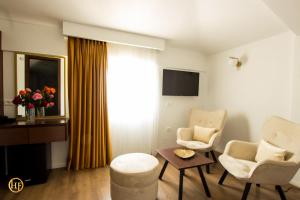 TV a/nebo společenská místnost v ubytování Hotel Fantasy