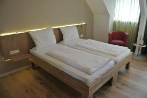 Postel nebo postele na pokoji v ubytování Hotel Jägerhof