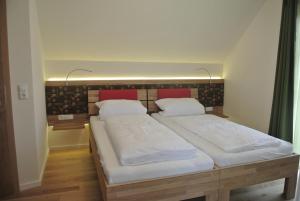 Postel nebo postele na pokoji v ubytování Hotel Jägerhof