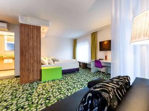 Televiisor ja/või meelelahutuskeskus majutusasutuses Ibis Styles Wien City