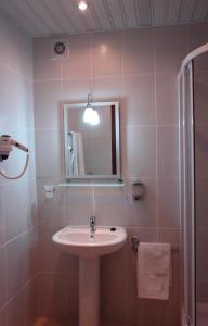 Koupelna v ubytování Ataer Hotel + 25 fotografií