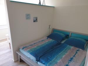 Ένα ή περισσότερα κρεβάτια σε δωμάτιο στο Große Hafenliebe