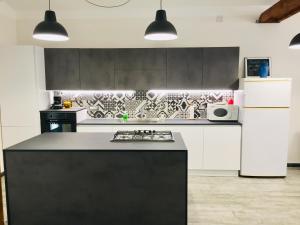 Kuchyň nebo kuchyňský kout v ubytování Villa Scilla e Cariddi