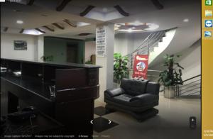 una oficina con una silla y una escalera en Centurion Hotel, en Naran