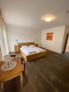 Ein Bett oder Betten in einem Zimmer der Unterkunft Hotel Villa Grande