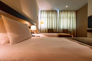 Postel nebo postele na pokoji v ubytování Zirve Hotel