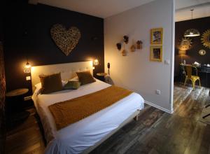 Postel nebo postele na pokoji v ubytování Le Gouverneur Hotel + 37 fotografií