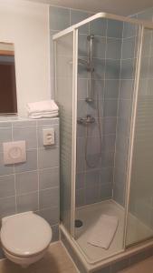 Ein Badezimmer in der Unterkunft Hotels Green Lemon Garni – Haus Krähenhütte