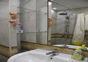 Ένα μπάνιο στο Vero Comfort Apartment +50 φωτογραφίες