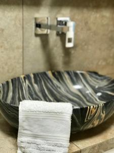Fotografia z galérie ubytovania Ekskluzywny Apartament GOLD Gardenia Dziwnów z widokiem na morze trzecie piętro 1 pokojowy EPapartamenty v destinácii Dziwnów