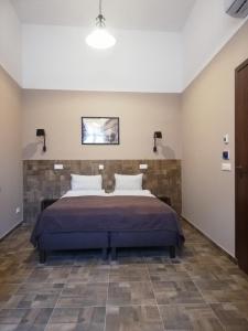 Postel nebo postele na pokoji v ubytování Promenade Panzió