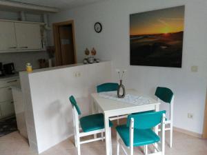 Kuchyň nebo kuchyňský kout v ubytování Haus Königstein FeWo Bielablick