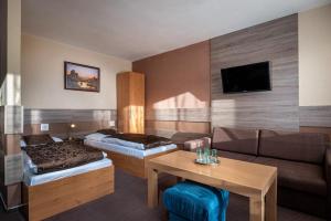 Letto o letti in una camera di Penzion Limba