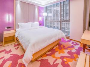 Ένα ή περισσότερα κρεβάτια σε δωμάτιο στο Lavande Hotel Chongqing Jiangbei Intemational Airport Teminal T3 Shop +41 φωτογραφίες