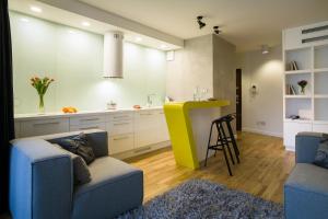 A kitchen or kitchenette at Oxygen Central Apartments