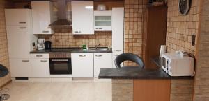 Kuchyň nebo kuchyňský kout v ubytování Haus Daniel Mariazell