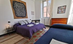 Un pat sau paturi într-o cameră la La casa sul porto
