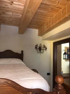 Postel nebo postele na pokoji v ubytování Garnì Astoria Hotel & SPA