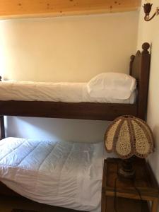 Postel nebo postele na pokoji v ubytování Garnì Astoria Hotel & SPA