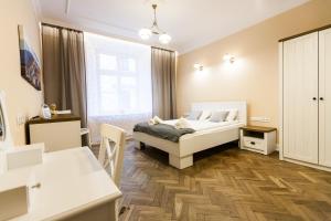 Posteľ alebo postele v izbe v ubytovaní Vintage Poselska Apartment