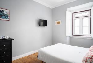 TV a/nebo společenská místnost v ubytování O Jardim da Tessa