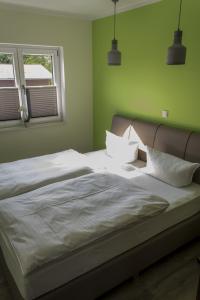 Postel nebo postele na pokoji v ubytování Schlüter Hotel & Restaurant