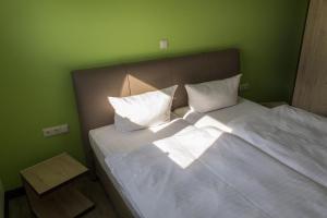 Postel nebo postele na pokoji v ubytování Schlüter Hotel & Restaurant