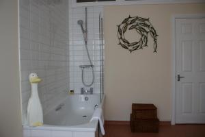 A bathroom at 10to12 Folkestone 