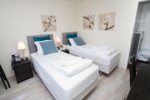 Ліжко або ліжка в номері Frost and Fire Hotel