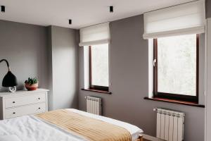 En eller flere senge i et værelse på Terrace apartment near beach