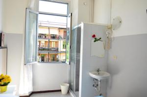 Een badkamer bij Hotel New Milan