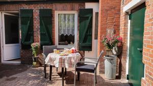 Nápoje v ubytování FeWo-Butze 2 mit Terrasse