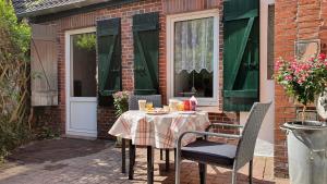 Patio nebo venkovní prostory v ubytování FeWo-Butze 2 mit Terrasse