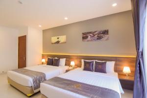 מיטה או מיטות בחדר ב-Hera Hotel Airport