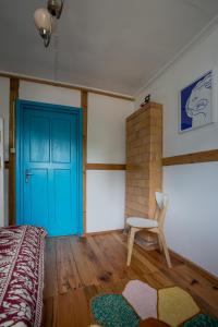 Postel nebo postele na pokoji v ubytování MorzeLas niebieski domek