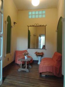 Χώρος καθιστικού στο Hostal Isidoros - Terminal de Buses