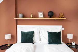 Łóżko lub łóżka w pokoju w obiekcie Boutique Design-Apartments Vienna