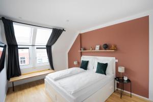 Łóżko lub łóżka w pokoju w obiekcie Boutique Design-Apartments Vienna