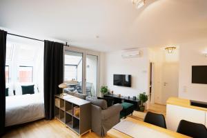 Telewizja i/lub zestaw kina domowego w obiekcie Boutique Design-Apartments Vienna