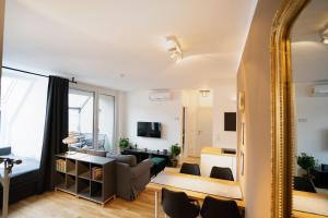 Telewizja i/lub zestaw kina domowego w obiekcie Boutique Design-Apartments Vienna